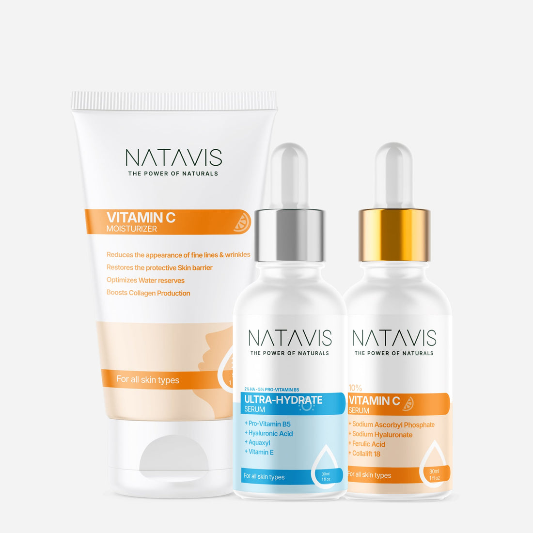 A set of three skincare products from NATAVIS, including a Vitamin C Serum, Ultra-Hydrate Serum, and Vitamin C Moisturizer, displayed with their packaging.